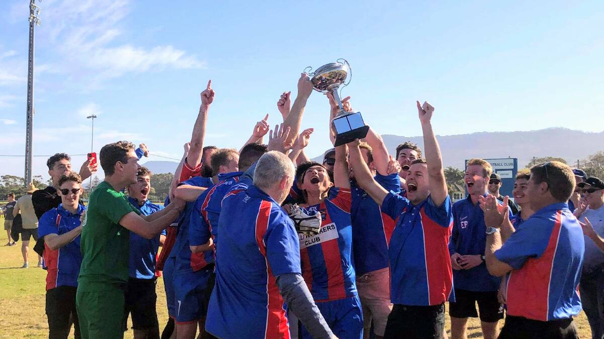 TOP OF THE WORLD: The Woonona Sharks celebrate after winning the 2020 Illawarra Premier League premiership at Ocean Park last October. Picture: Nic Wilson