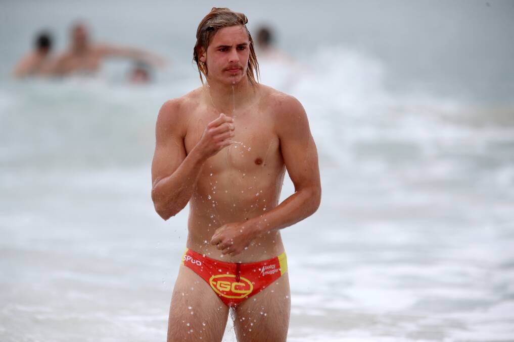 FUN IN THE SUN: Jeremy Sharp enjoys a swim at North Wollongong Beach on Tuesday. Picture: Sylvia Liber