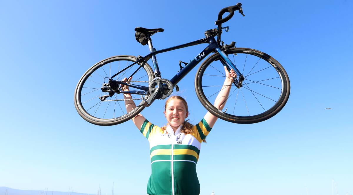 RACING AHEAD: Woonona's Sarah Cliff is showing plenty of promise on the bike. Pictures: Sylvia Liber and Vanessa Cliff