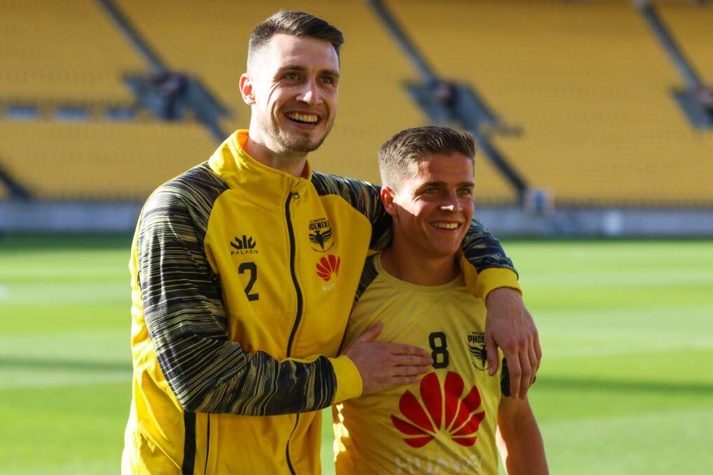HAPPY: Liam McGing (left) with a teammate. Picture: Phoenix Media