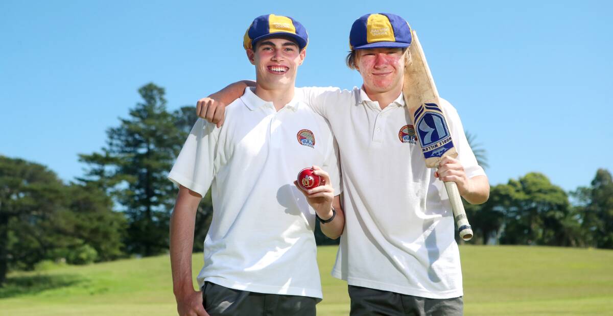 LOVING THE GAME: Bulli High School students Victor Strange and Thomas Williams are set to face off in rep cricket. Picture: Sylvia Liber