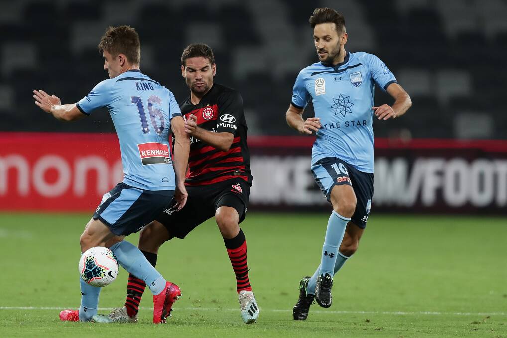 CHALLENGE: Joel King (left) and Tate Rusell in action during an A-League game last season. Picture: Mark Metcalfe/Getty Images