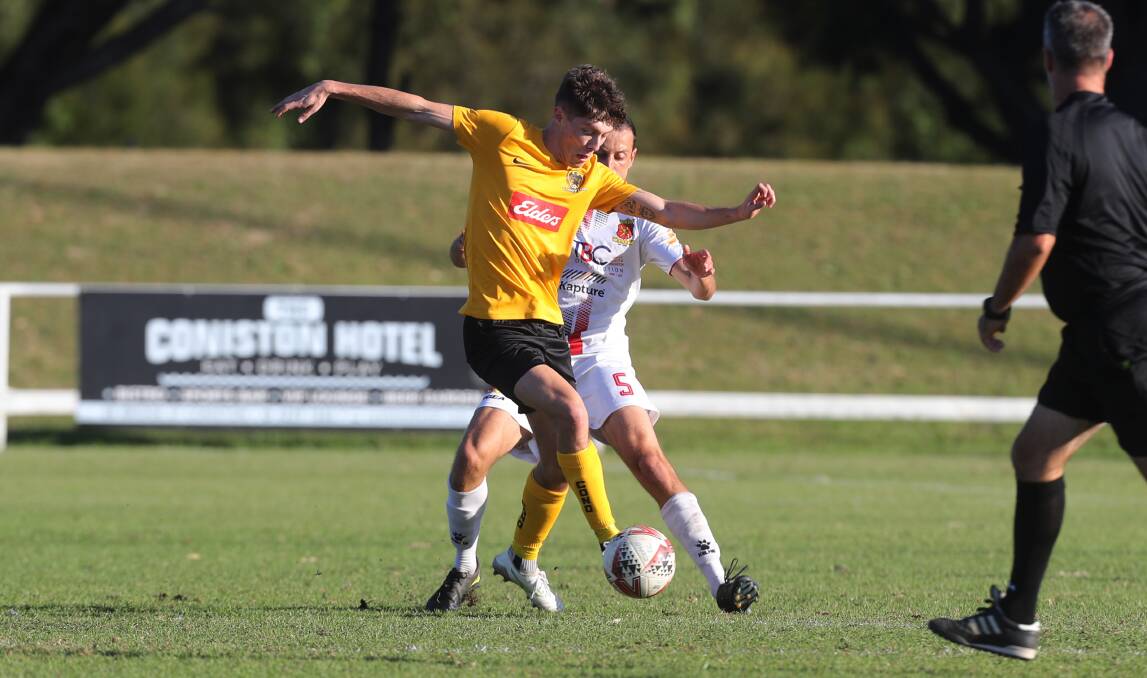 Coniston striker Adam Voloder controls possession ahead of a Cringila opponent when the sides met in 2021 at JJ Kelly Park. Picture by Robert Peet