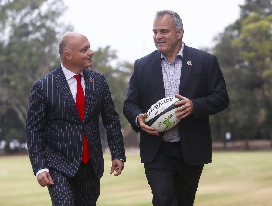 TEAMWORK: UOW's Professor Alex Frino chats rugby with Crusaders CEO Colin Mansbridge. Picture: Anna Warr