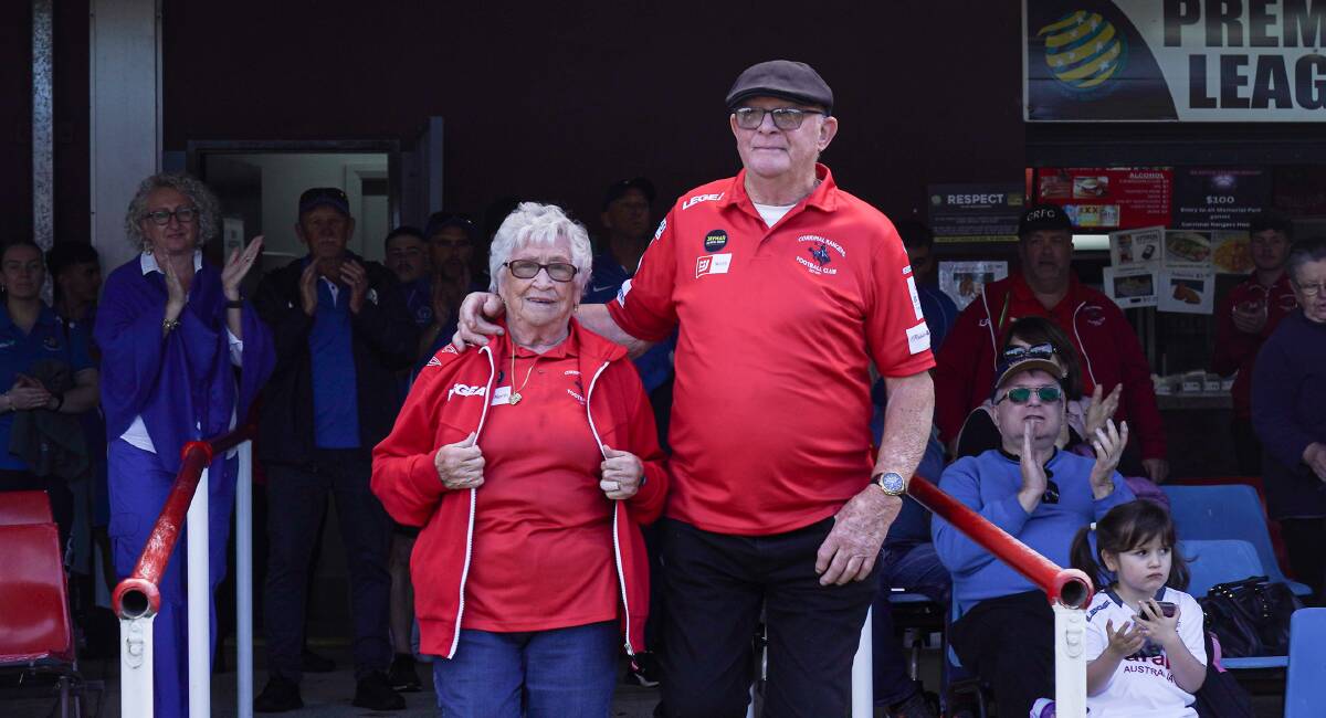 Retiring Corrimal stalwarts Peter and Beryl Dent receive a round applause from the faithful at Memorial Park. Picture - @gragrapix