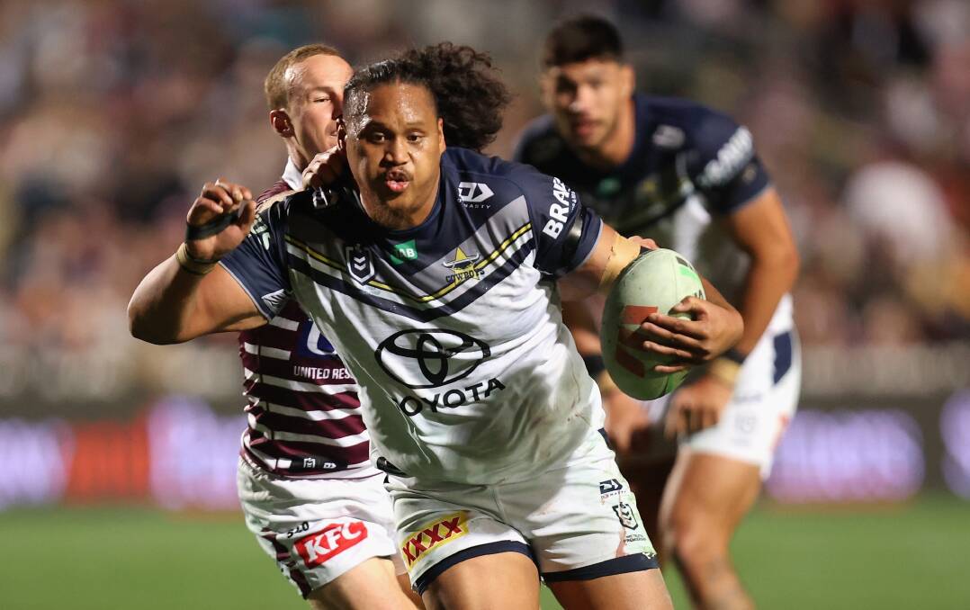 Luciano Leilua finds some space behind the defensive line while representing the Cowboys against the Sea Eagles last year. Picture by Tim Allsop/Getty Images