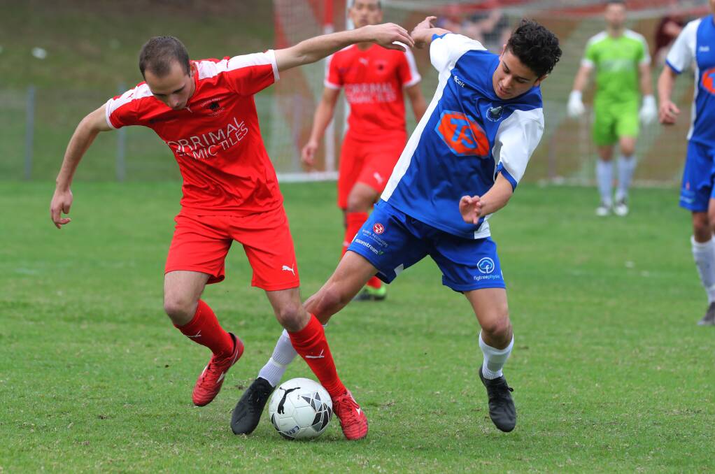 NEXT GENERATION: Tarrawanna's Nick Tomasiello (right) contests a Corrimal opponent for ball possession. Picture: Robert Peet