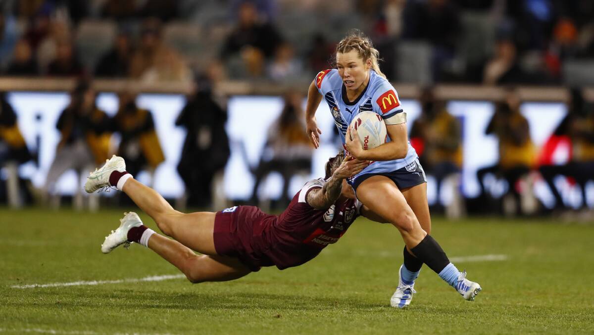 ON THE MOVE: Sky Blues fullback Emma Tonegato gets around her Queensland opponent on Friday night. Picture: Keegan Carroll