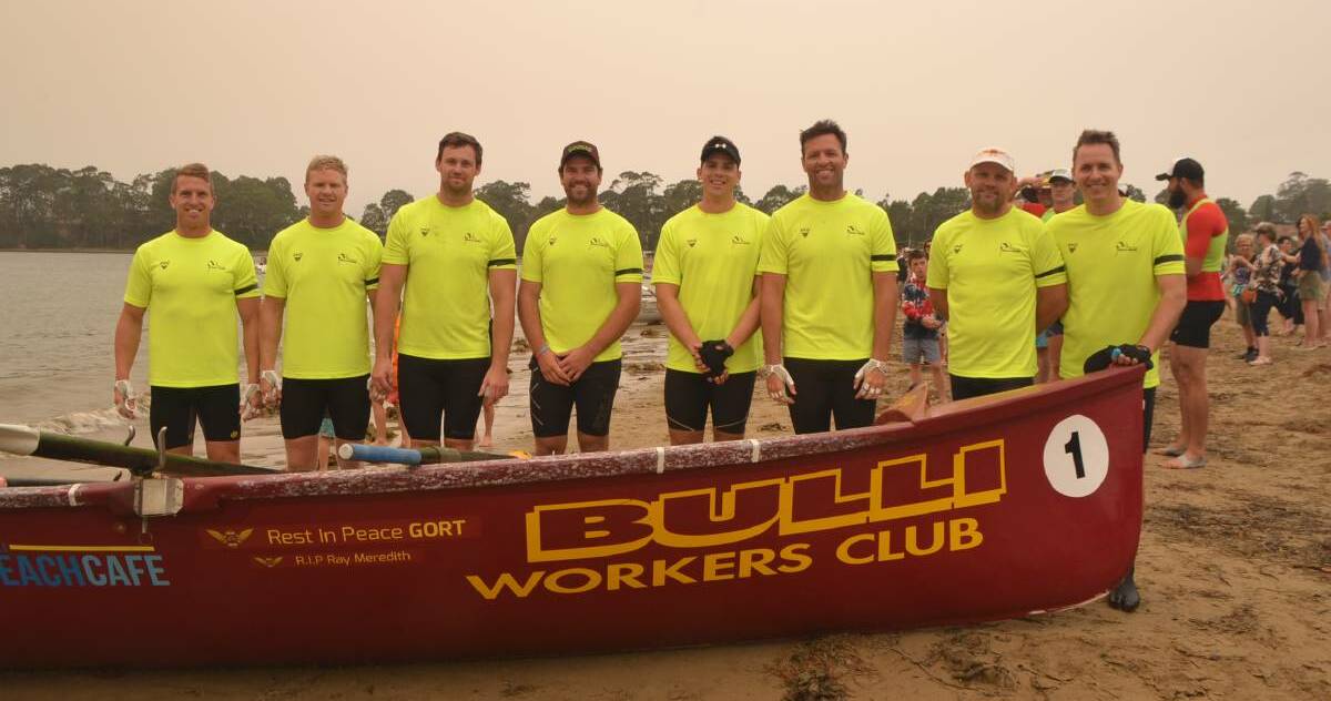 REIGNING CHAMPIONS: The Bulli men's open crew pose for a photo on day one of the George Bass Marathon. Picture: Claudia Ferguson