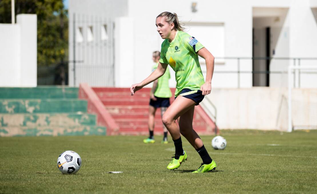 STAYING ON TRACK: Mackenzie Hawkesby prepares to kick the ball during a Matildas training camp. Picture: Ann Odong