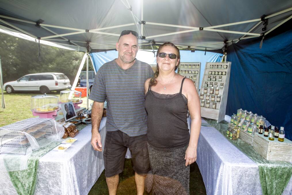 Darren Burnett and Maria Darby tending their stall, Ria's Dried Herbs and Spices.