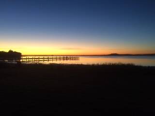 Peaceful: A beautiful sunrise over Lake Illawarra by Wayne Oxenbridge. Send us your pictures to letters@illawarramercury.com.au