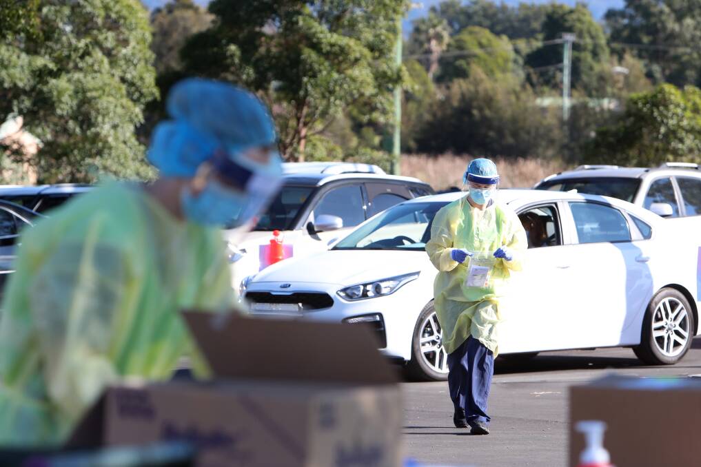 A drive through COVID-19 testing clinic started operating on Friday at Albion Park Showground and had a steady stream of people wanted to get tested. Picture: Sylvia Liber