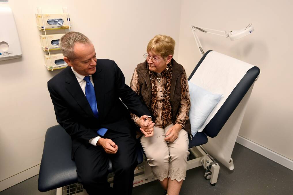 Colleen Webster from Nowra with Bill Shorten at Grand Pacific Health in Nowra on Wednesday. Picture: Dominic Lorrimer