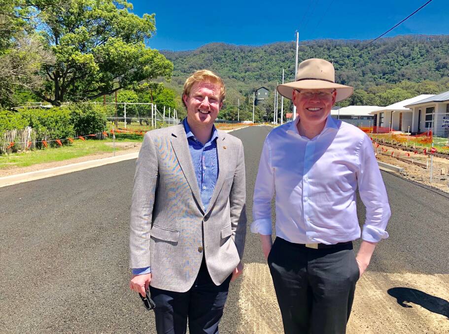 Tick of approval: Wollongong City councillor Cameron Walters and Kiama MP Gareth Ward inspected the Wongawilli Road works.