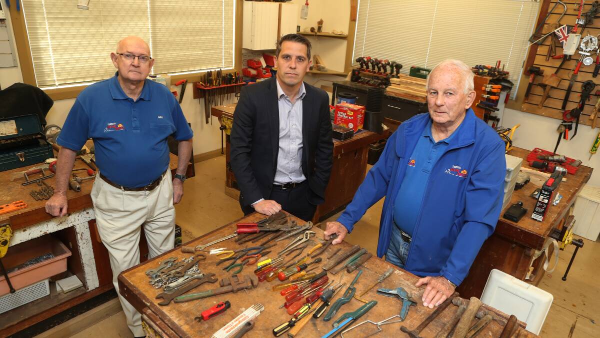Not happy: Thirroul Men's Shed's Sandy Christie, MP Ryan Park and Charlie Taylor are fighting to have a water bill waived. Picture: Robert Peet