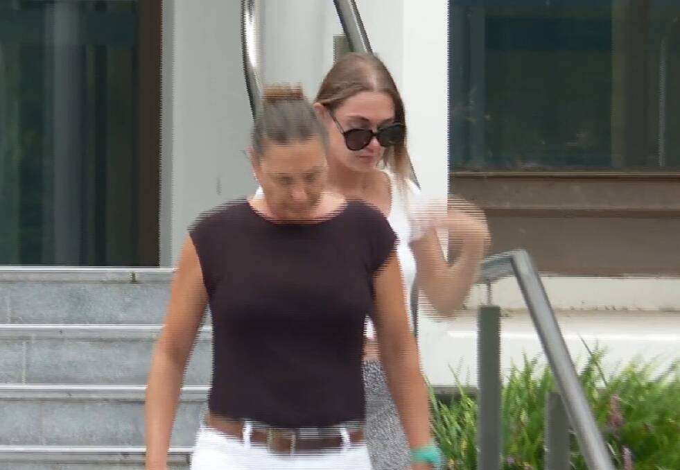 Casey Holmes was visibly distressed after being convicted for assaulting a man. Her mother supported her in court. Picture: Nine News Illawarra