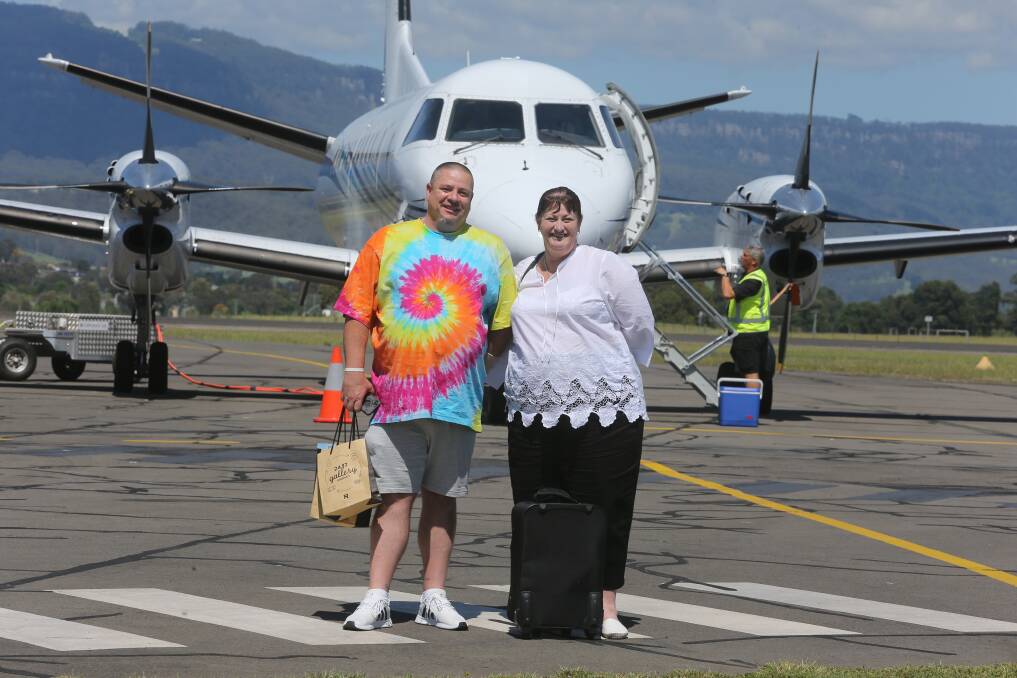 Happy passengers: Barrack Heights residents John and Joanne Whyte flew with Fly Corporate into Illawarra Regional Airport from Melbourne. They enjoyed the smooth ride and not having to travel to Sydney. Picture: Robert Peet