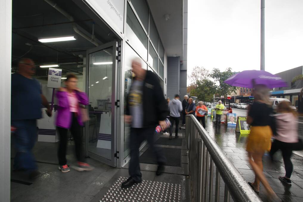 Deomcracy in action: Many people from across the Illawarra were voting early at Wollongong's Crown Street pre-poll centre on Friday. Picture: Anna Warr