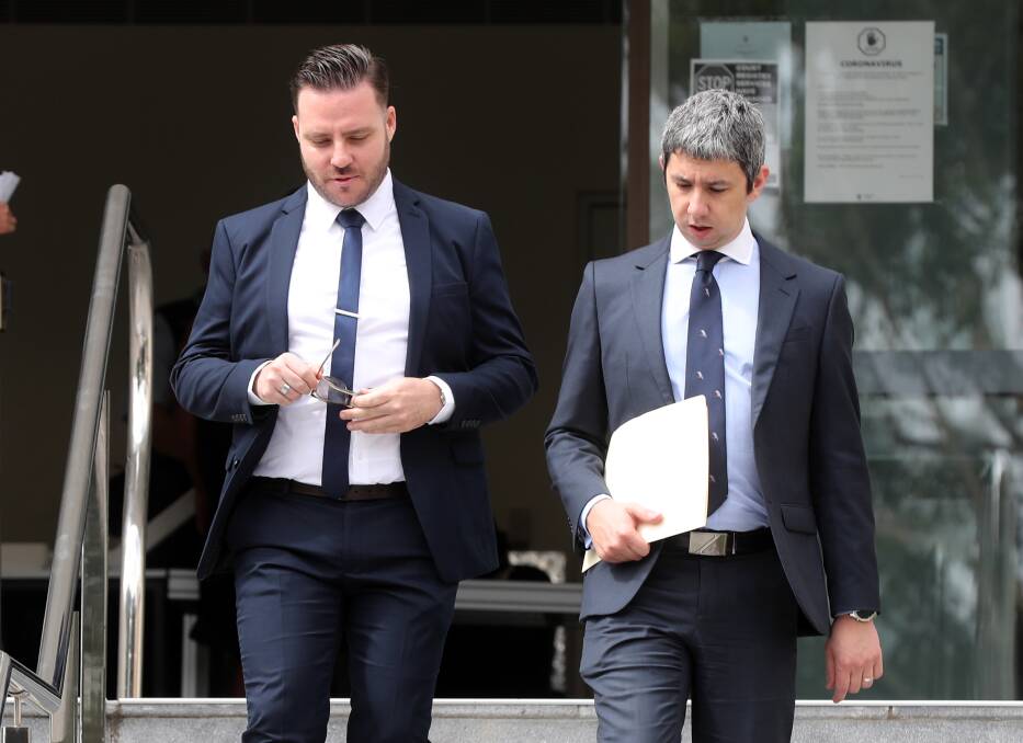 Thomas Anderson (left) with lawyer Robert Foster leaving court after he was charged with seven more offences over child abuse material. Picture: Robert Peet