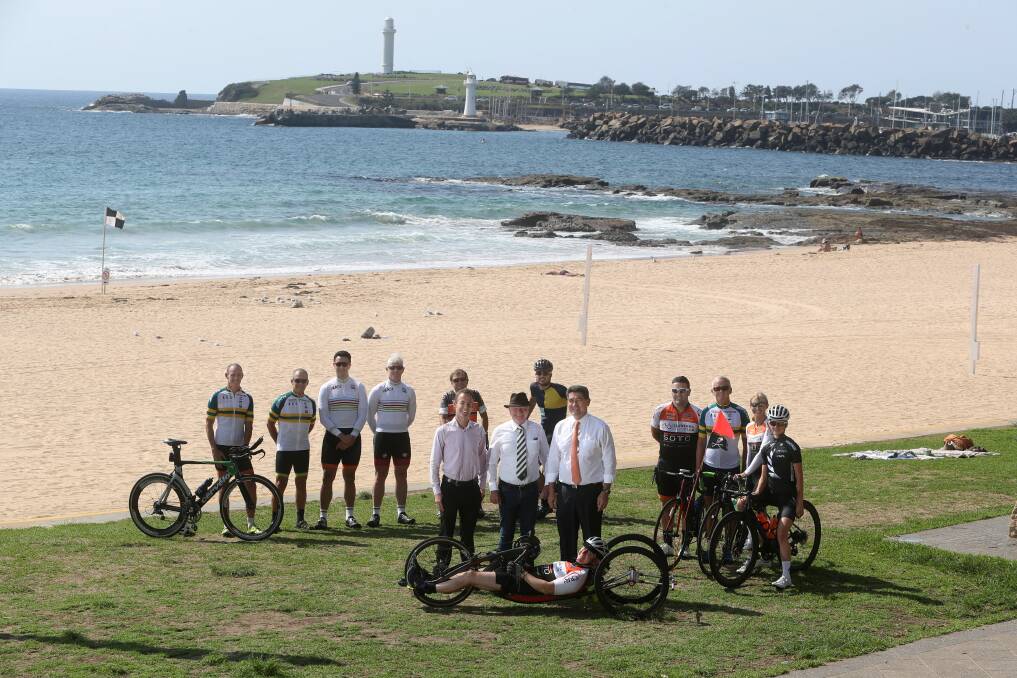 Sport Cycling Australia general manager Kipp Kaussman, Wollongong Lord Mayor Gordon Bradbery and acting Minister for Sport Geoff Lee with Illawarra Cycle Club member Brian Gardner and other riders at the announcement of a Legacy Fund. Picture: Robert Peet