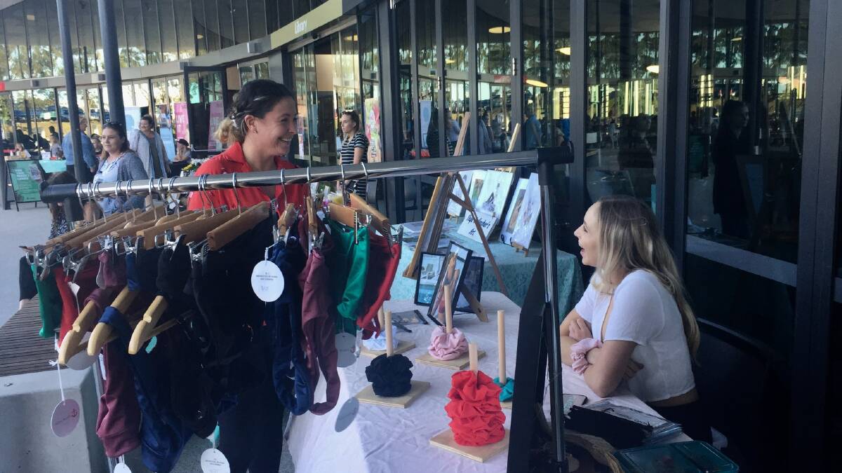 There is lots to see and buy at the first Shellharbour City Youth Market at civic plaza. Picture: Sylvia Liber
