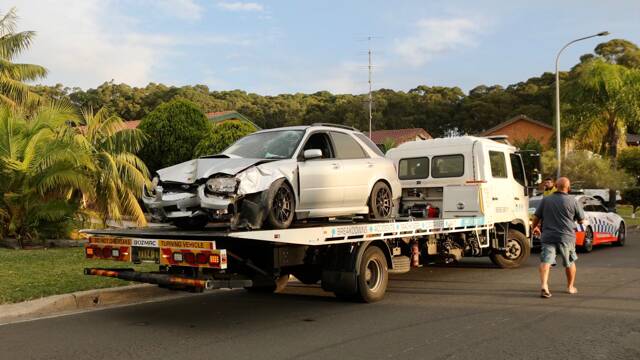 The reportedly stolen car was damaged after it was crashed into a home. Picture: Adam McLean
