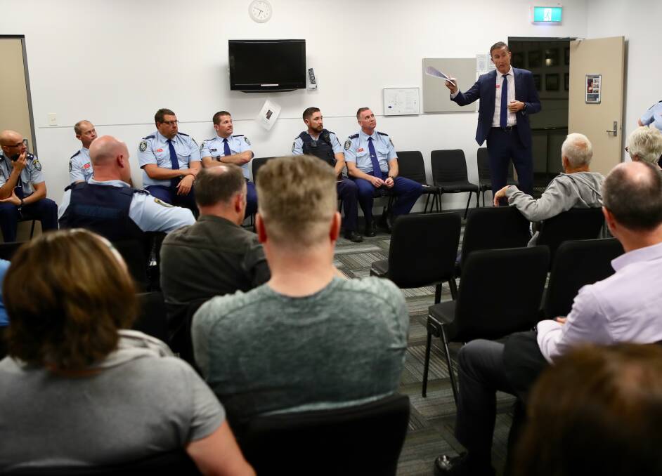 Discussion: Wollongong police inspectors spoke to residents about crime incidents at a Thirroul community forum in October. Picture: Adam Mclean