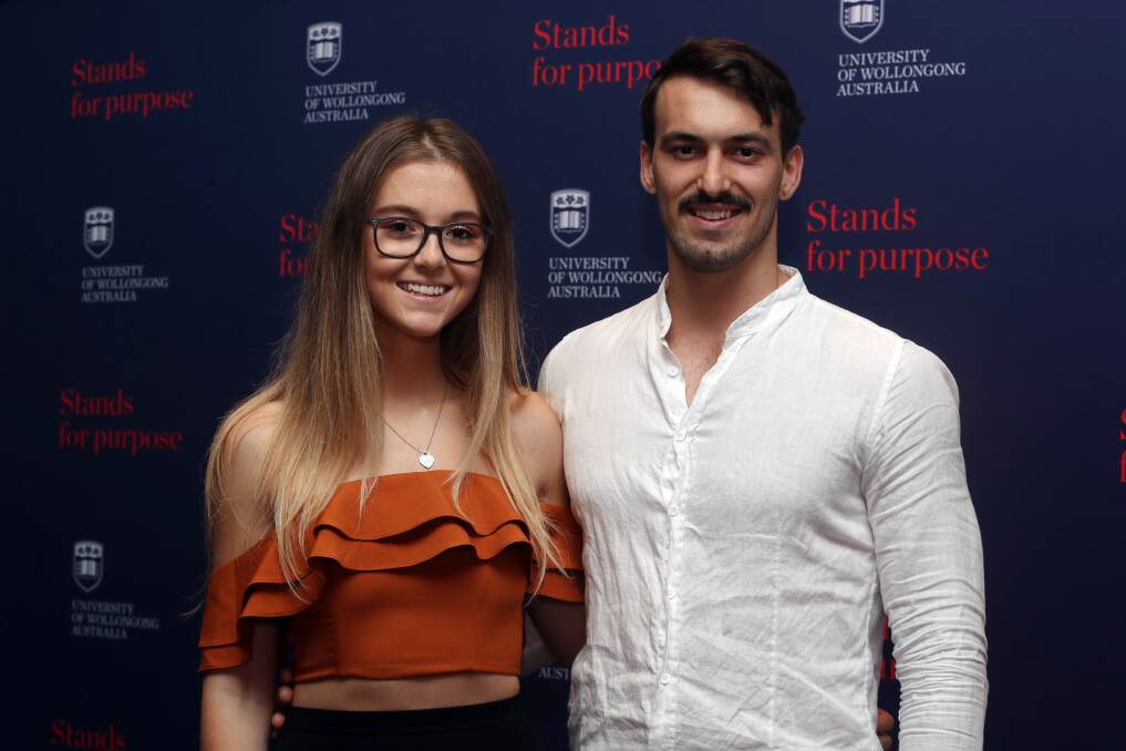 Congrats: Illawarra Mercury Journalism Prize winner Zoe Bradbury with partner Aengus Ylias at the Faculty of Law, Humanities and the Arts Awards Night at the City Beach Function Centre. Picture: Robert Peet