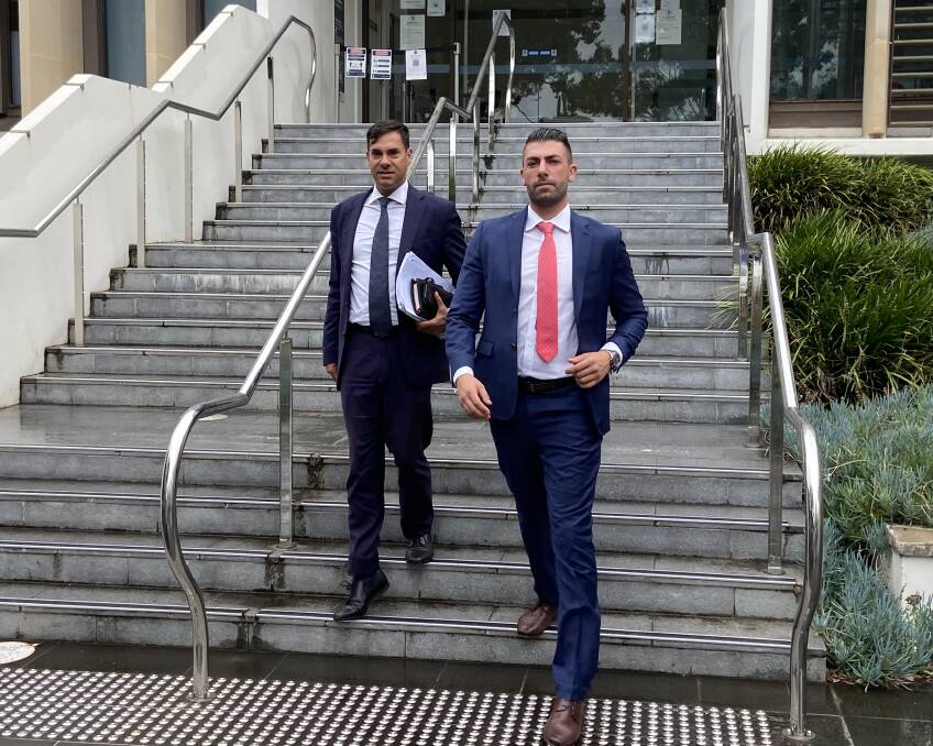 A-List Property Group Wollongong principal Anthony Sorace (right) left Wollongong Local Court on Tuesday, with his lawyer Chris Eliopoulos, without a conviction for possessing an illicit drug. Picture: Ashleigh Tullis