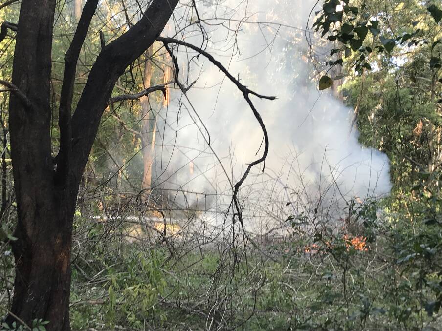 Firefighters had to extinguish a fire in Balgownie bushland. Picture: Ashleigh Tullis