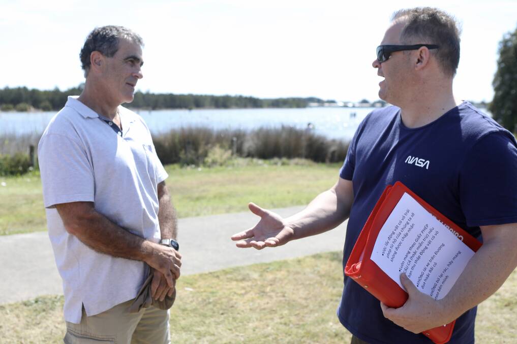 Local residents John Davey and Rob Chilton discussed their differing views however both support a moratorium on cockle fishing. Picture: Adam McLean