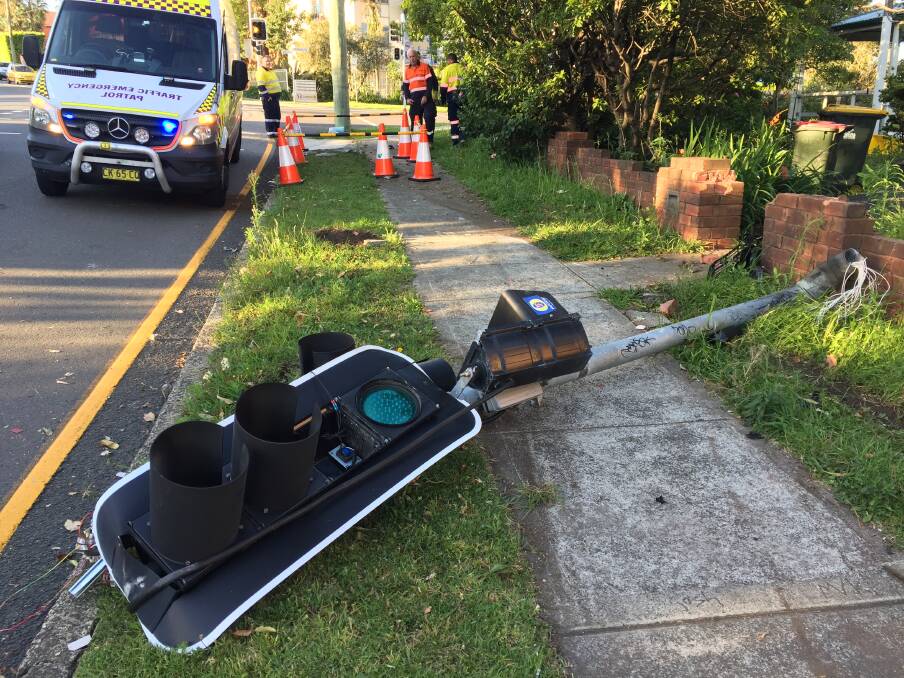 A driver crashed into a traffic light on the corner of Corrimal and Gipps streets on Tuesday afternoon. Picture: Ashleigh Tullis