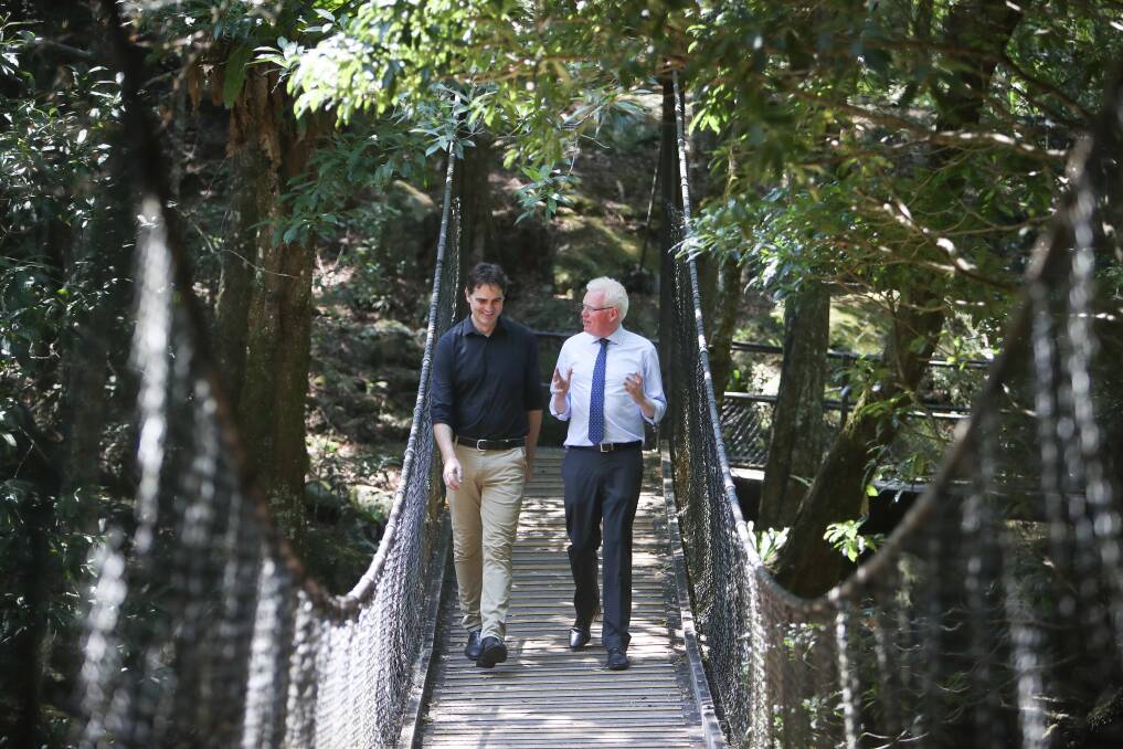 New experience: NPWS South Coast branch director of park operations, Kane Weeks walks with Kiama MP Gareth Ward in the Minnamurra Rainforest. Picture: Adam McLean