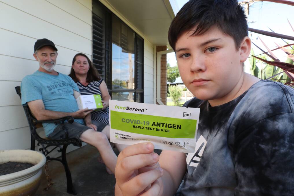 Andrew and Donna Beer with son Alex are anxious about students returning to classrooms. Picture: Robert Peet
