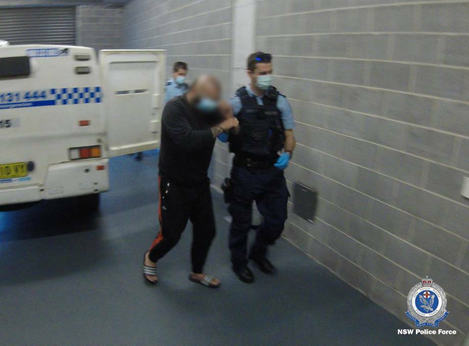 Joint arrest: Father and son Robert and Daniel Bojlevski were arrested at their Primbee home during a police raid over serious drug supply allegations. Pictures: NSW Police