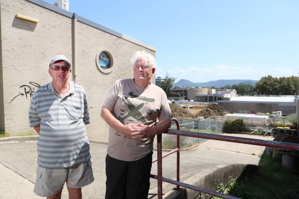 Fed up: Barry Armstrong and John Higgins are dismayed at the lack of consent conditions for a Wollongong development. Picture: Sylvia Liber