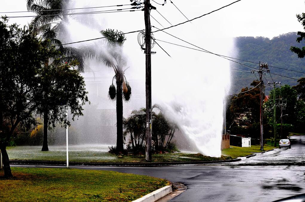 A water main on Dymock Street in Fairy Meadow burst on Wednesday morning. Picture: Col Bruton 