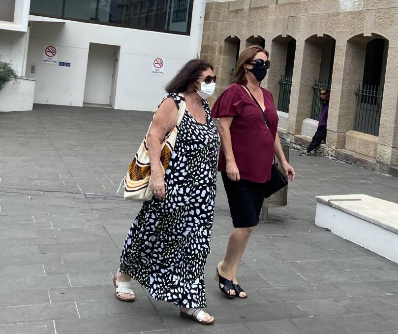 Kerrie Ann Barry (right) with a support person leaving Wollongong Local Court. Picture: Ashleigh Tullis