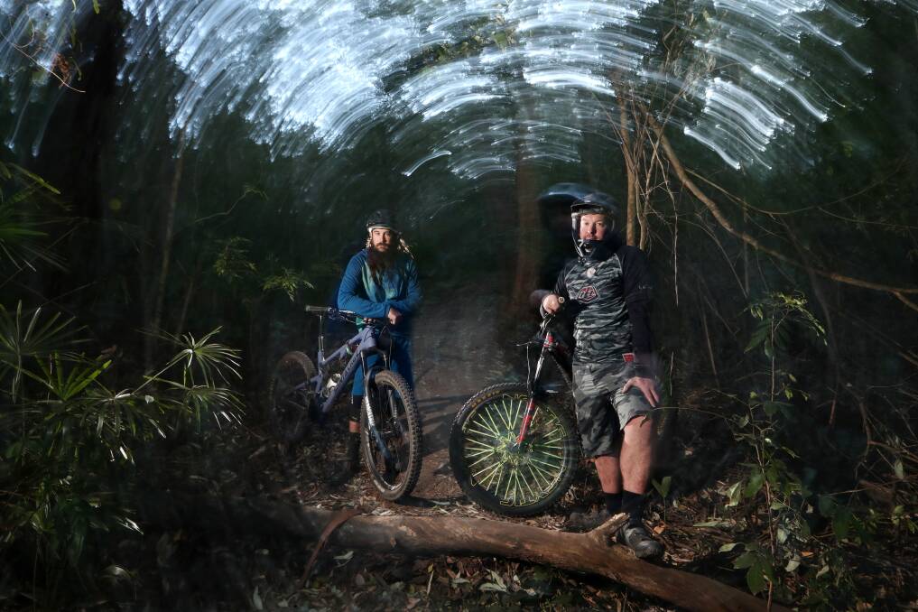 Keiran Volk and Jerry Harriman support the state government's proposal to formalise a mountain bike track network on the Illawarra escarpment. Picture: Sylvia Liber