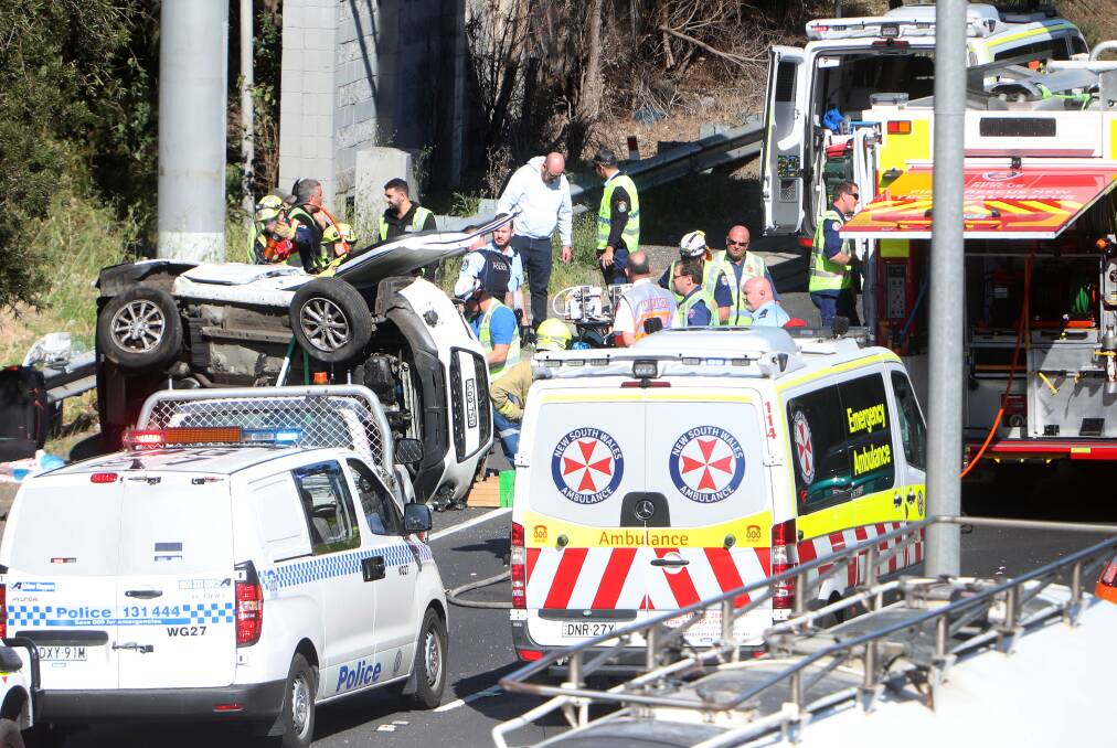 Emergency services were on scene for about two hours to free a driver trapped in the car. Picture: Sylvia Liber