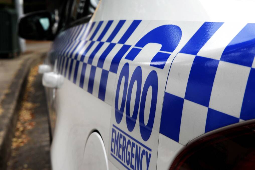 Police hunt driver after stolen car found alight in Albion Park