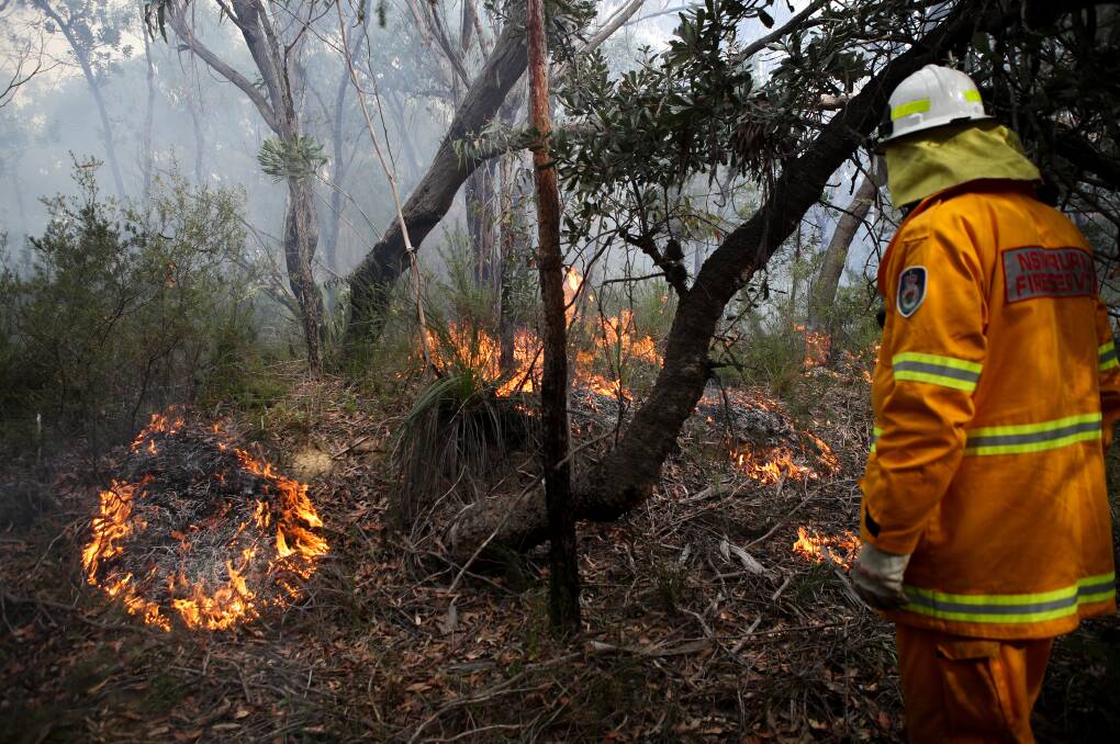 RFS and Fire and Rescue crews carried out a 60 hectare hazard reduction operation on Wednesday near Helensburgh. Pictures: Adam McLean and Fire and Rescue drone photos