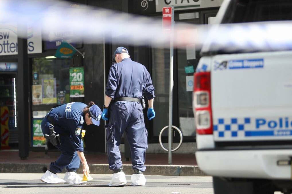 Police combed the street collecting evidence on Sunday. Picture: Adam McLean