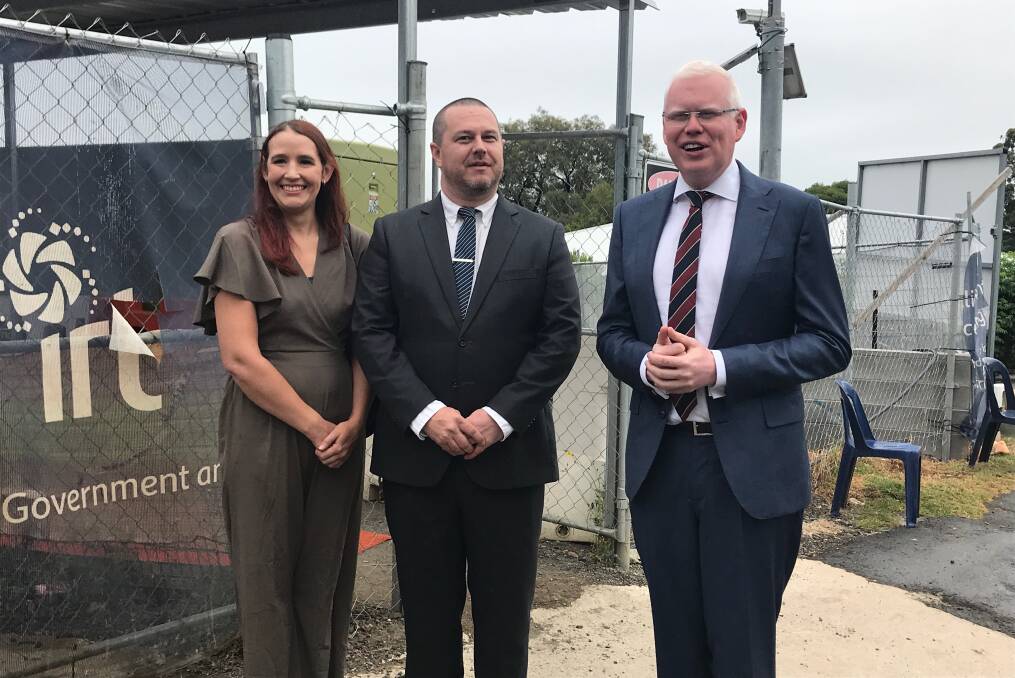 Chris Atlee (middle) with wife Melissa and Parliamentary Secretary for the Illawarra Gareth Ward outside the new Bulli Hospital.