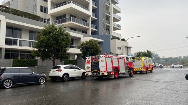Fire crews on scene responding to flooding at Victoria Square apartments on Young Street. Picture: Ashleigh Tullis