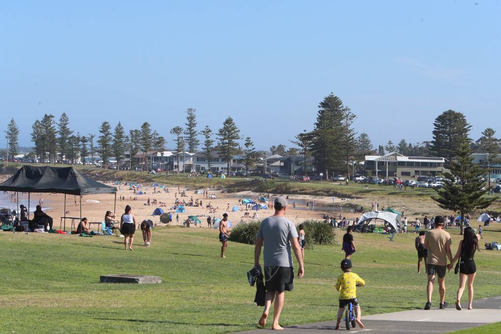 Social distancing: Wollongong beaches, including Sandon Point, were packed with locals and visitors across the weekend. Picture: Sylvia Liber