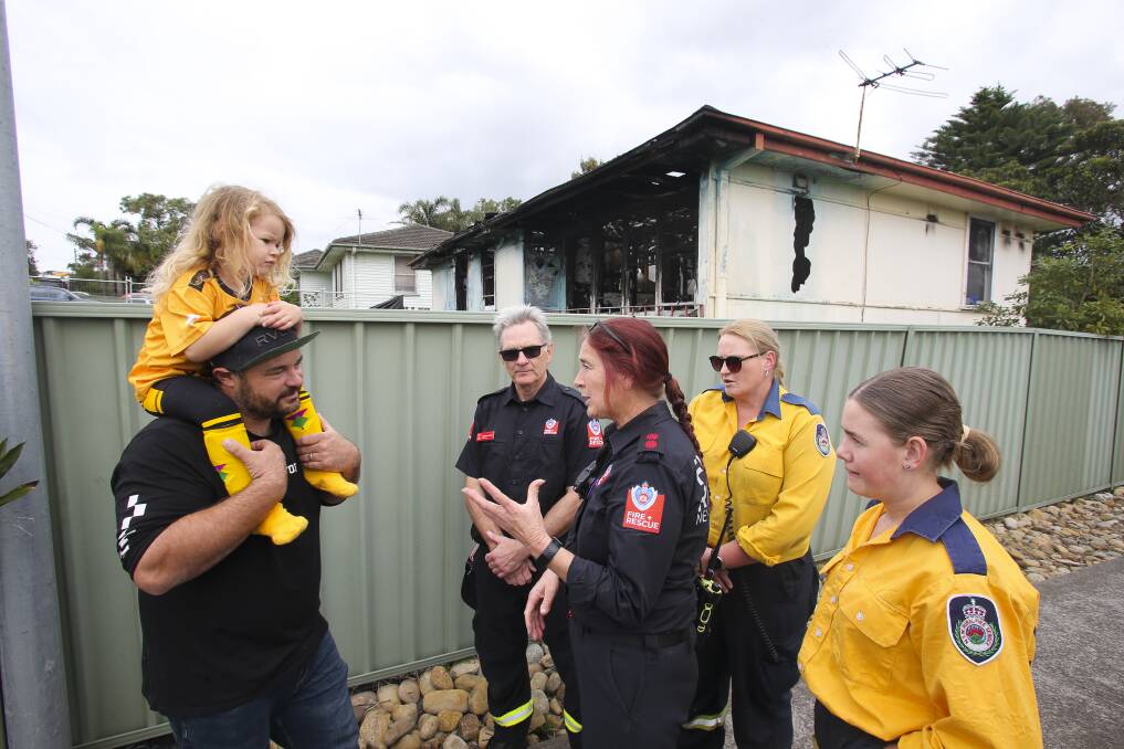 Firefighters spoke to Helensburgh residents about the need to have a working smoke alarm after a house was completely destroyed in a blaze last week. Picture: Anna Warr