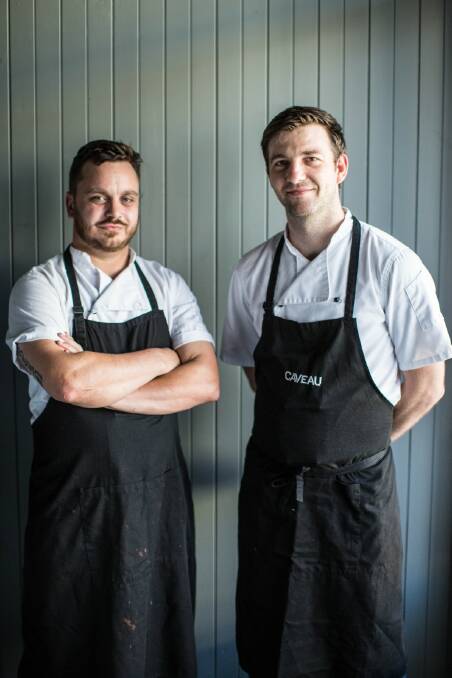 Chuffed: Simon Evans and Tom Chiumento are pleased their restaurant, Caveau, has received a Good Food Guide Chef's Hat for the 14 year running. Picture: Supplied