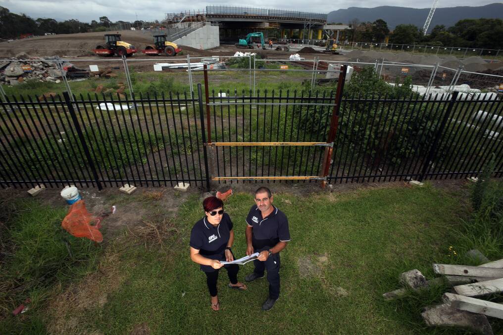 Dispute: Rita Di Cesare and her brother Gino, say the Fowlers Road to Fairwater Drive Link bridge and the deviation of Marshall Street will mean passing trade significantly declines for their smash repair business. Picture: Robert Peet